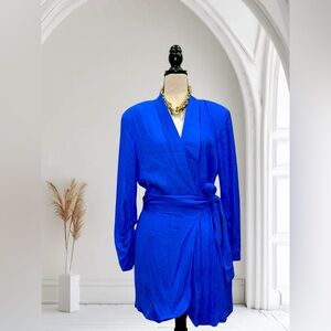 Long sleeve wrap dress with a tie at the waist. Royal blue colour.